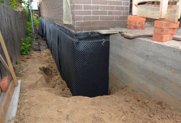Happy homeowners after waterproofing job in Swedesboro